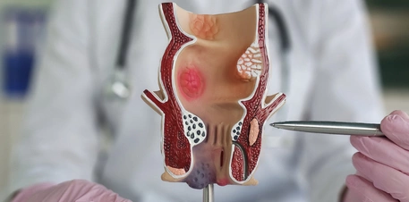 A glass of water, a notebook and fresh wholegrains on a table